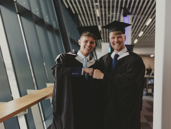 Graduates in gowns and hats